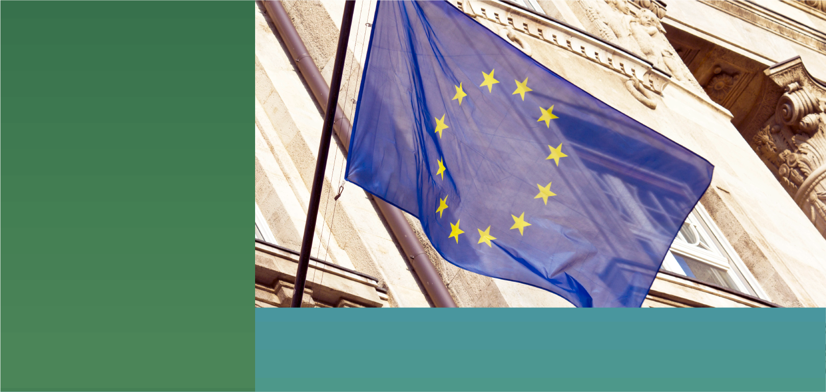 Close up shot of the European Union flag hanging from a building.