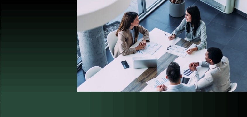 Office workers hold a meeting